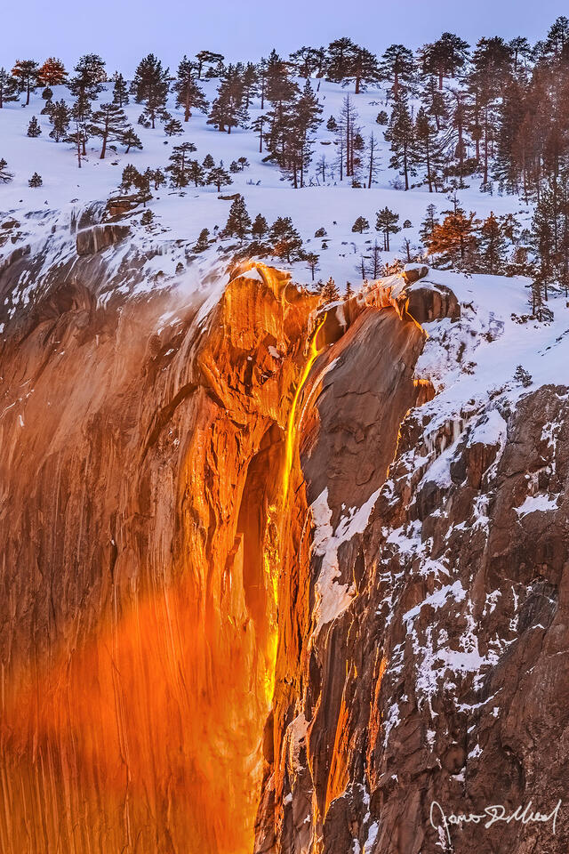 Sunset lights the waters of Horsetail Fall orange like Lava as the Yosemite Firefall comes to life.