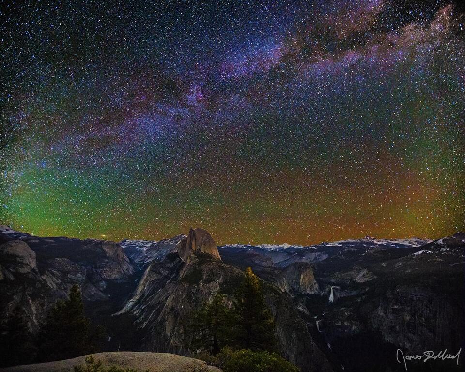 The Milky Way stretches across the night sky above Half Dome, Clouds Rest, Nevada Falls, Vernal Falls, Quarter Domes Kuna Crest and the Yosemite High Country.