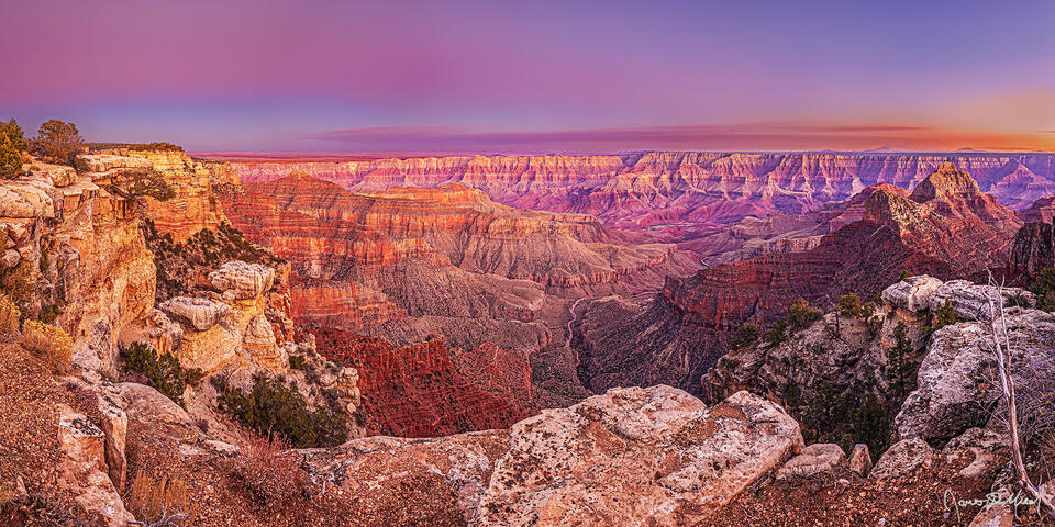 The Belt of Venus lights the skies at sunset casting a warm glow over Jupiter Temple, Venus Temple, Apollo Temple, Cape Final, Freya Castle and the North Rim.