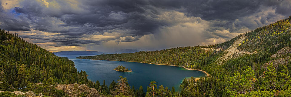 A Squall Line forms as storm clouds over Lake Tahoe and Emerald Bay bring thunderstorms and rain to the area while South Lake Tahoe sits under a flood watch.