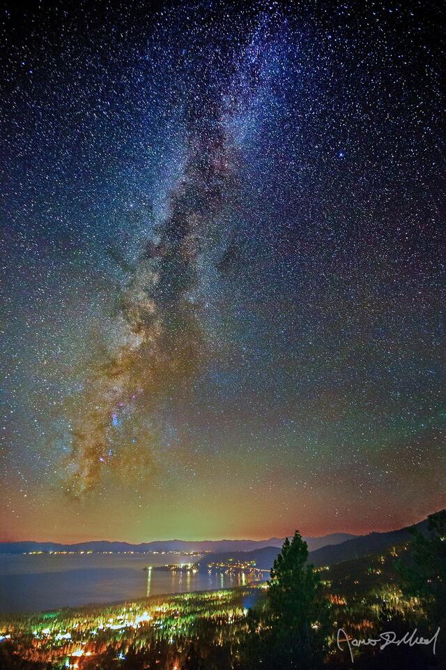 The Milky Way rises high into the night sky above Incline Village and Lake Tahoe along the North shores of Lake Tahoe.