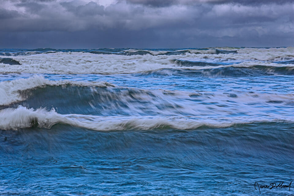 Waves crash about in the Pacific Ocean during King Tides as a winter storm brings rough waters to the ocean along the Oregon Coast.