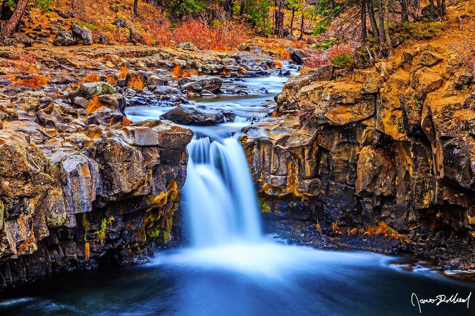 Fall colors line the banks of the McCloud River as is weaves its way through the Shasta-Trinity National Forest above Lower Falls.