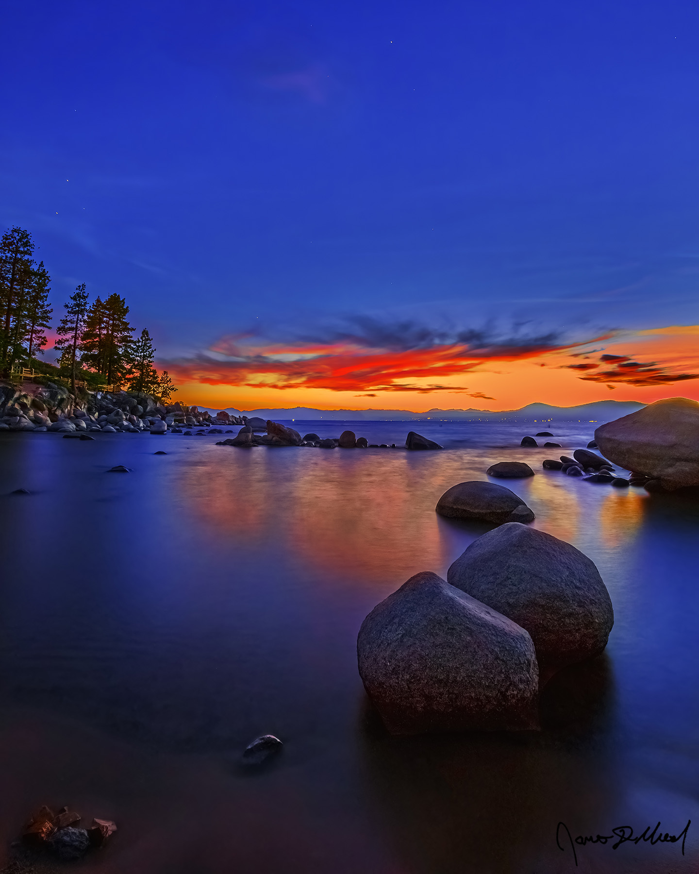 Mystic - Sand Harbor Sunset Glow at Nautical Dusk over Lake Tahoe, Diver's Cove & the Sierra Nevada Sunlight from far below the horizon illuminates the clouds near the horizon at nautical dusk above Sand Harbor and Lake Tahoe.