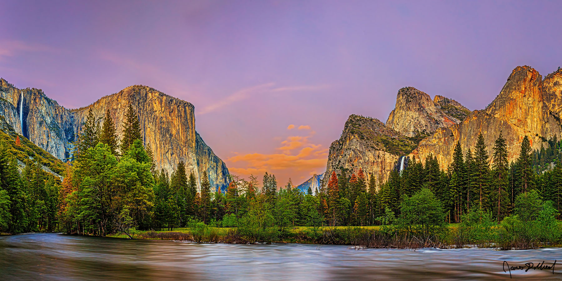 The Grand Cathedral Alpenglow bathes the skies above in pastel light as Ribbon Fall and Bridalveil Fall cascade down the granite cliffs framing El Capitan and Cathedral Rocks.