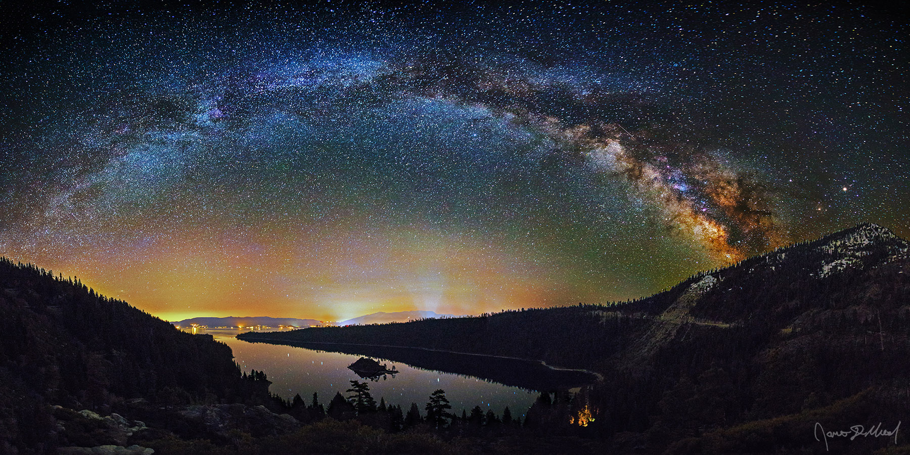 Emerald Arch - Emerald Bay Milky Way Arch over Lake Tahoe, Fannette Island, and the Sierra Nevada The Milky Way Arch stretches across the night sky over the Sierra Nevada Mountains and the waters of Emerald Bay and Lake Tahoe in California.