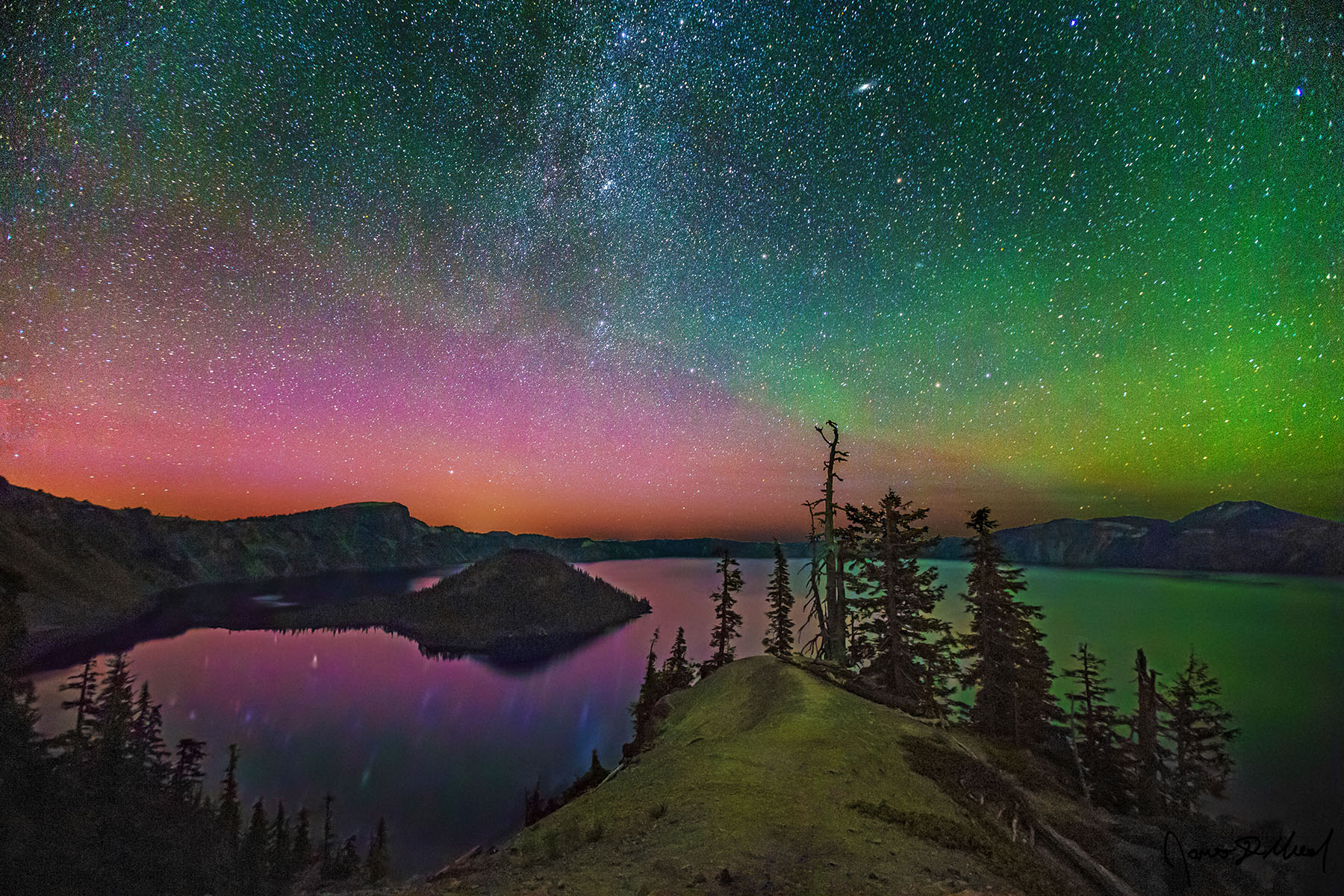 Night Magic - Crater Lake Aurora Borealis, Andromeda Galaxy and Milky Way Arm over Wizard Island Magentas and greens of the Aurora Borealis light up the skies above Crater Lake and Wizard Island as the spiral arm of the Milky Way rises into the night sky.