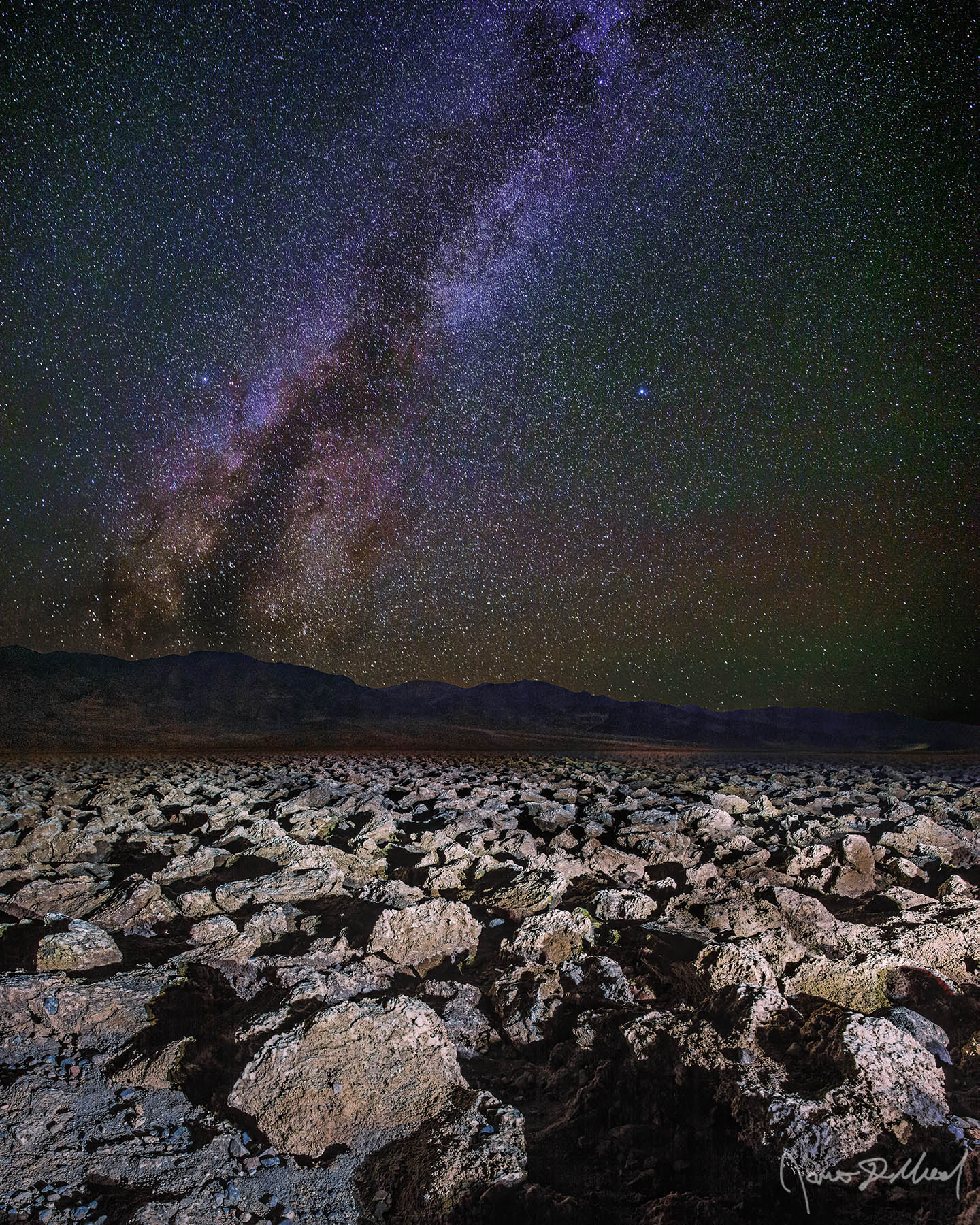 Boulder Path - Milky Way and Summer Triangle over Devils Golf Course, Death Valley, CA The Milky Way spiral arm rises high into the skies above Devils Golf Course Salt Pan in Death Valley National Park