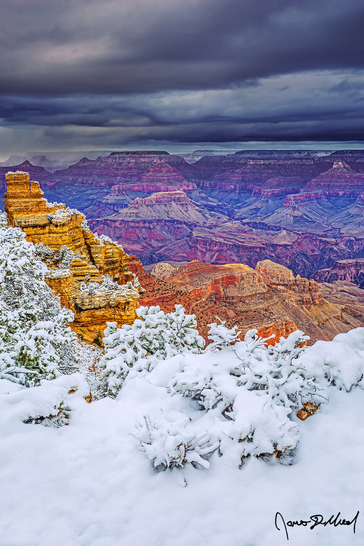 Wrath of Winter - Winter Storm over Snow Covered Yaki Point and the Grand Canyon A winter storm begins to pound Point Sublime on the North Rim as storm clouds darken the sky overhead while snow blankets the ground and trees on the South Rim.