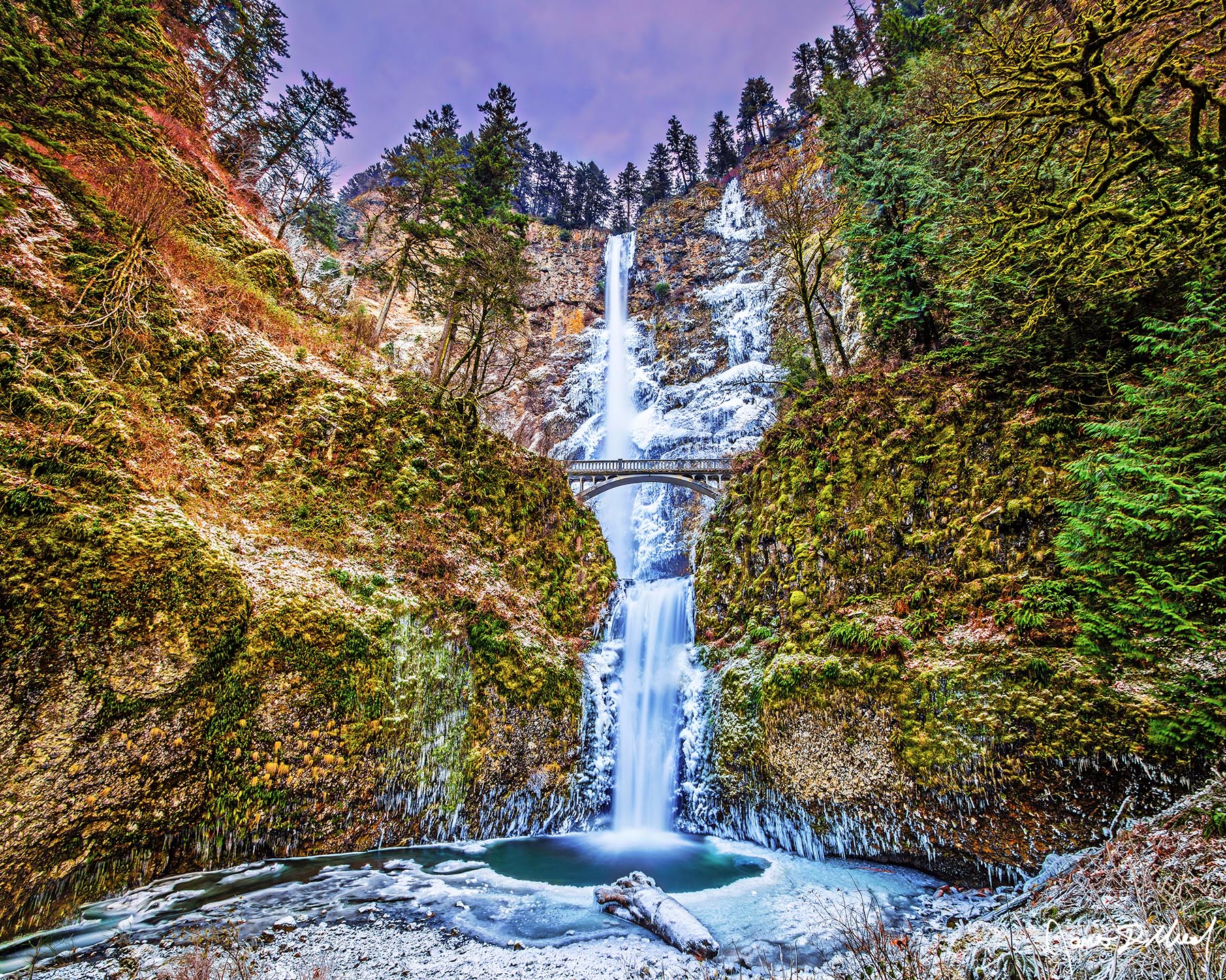 Winter Symphony- Multnomah Falls Ice during a Winter Sunset, Columbia River Gorge, Oregon A December deep freeze plunged temperatures down into the teens for several weeks, causing Multnomah Falls to begin to freeze over.